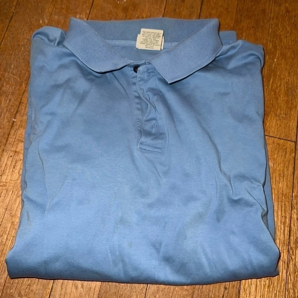 L.l. Bean polo shirt, light blue, XL, wrinkled from being folded, lots of life!